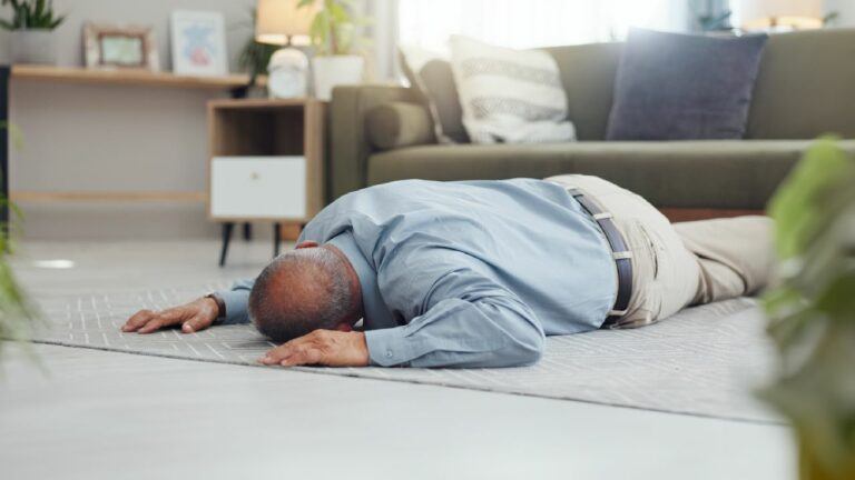 Man has fainted in the living room.